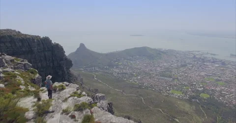 Moving Aerial from top of Table Mountain, Man Stock Footage 60115046