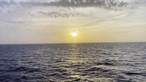 Moving Aerial View of Ocean Surface During Sunset Vídeo Stock 241567461