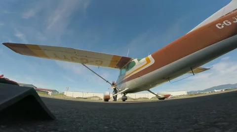 Moving an airplane into it's parking space Stock Footage 40997666