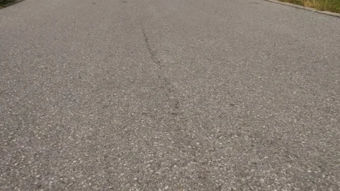 Moving along asphalt Stock Footage 135443142