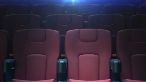 Moving Along Empty Cinema Chairs with the Back Light Seamless. Looped 3d Stock-Footage 112337845