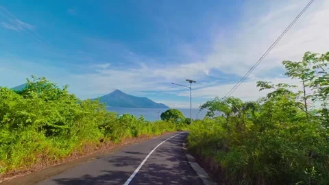 Moving Along an Empty Tropical Coastal Road Vidéo 336179592