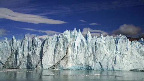 Moving along face of Perito Moreno glacier in Patagonia Stock Footage 131046091