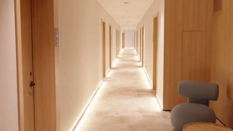 Moving along a long corridor in a modern building Stock Footage 306436408