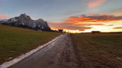 Moving along the mud road in front of the mountain Stock Footage 232768252