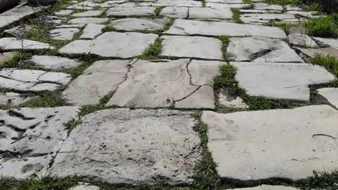 Moving Along The Old Stone Path With Large Slabs In The Ancient City Stock Footage 195101228