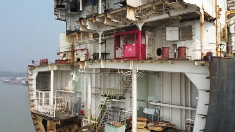 Moving along an opened stern of a ship at a ship breaking yard in Bangladesh Video stock 327167469