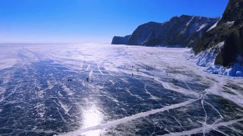Moving Along Rocky Cliffs Above Frozen Lake Baikal Stock Footage 342235825