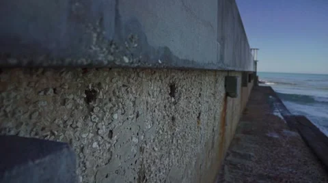 Moving Along Rustic Sea Wall With Glidecam Video stock 63055655