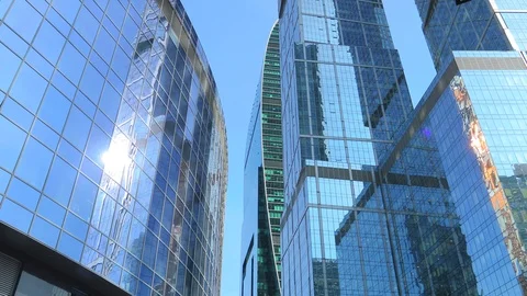Moving among skyscrapers. Modern office building. Glass and reflections Stock Footage