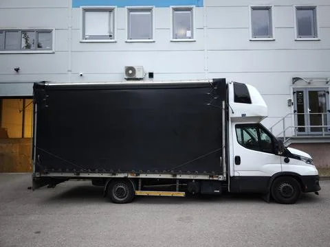 Moving and logistics service - freight truck prepared for transport Stock Photos