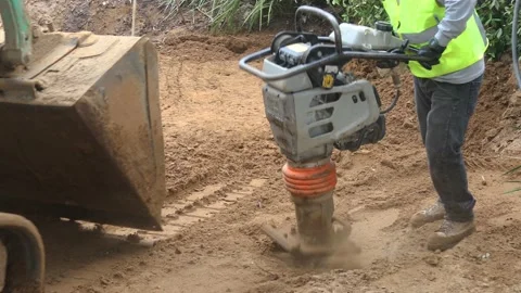 Moving and packing soil Stock Footage 143227338