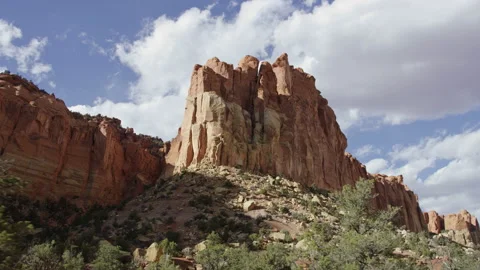 Moving around impressive red rock mountain with sheer cliffs, Escalante 스톡 동영상 248568606