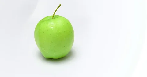 Moving around one green apple 스톡 동영상 116795310