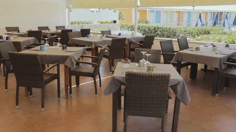 Moving around set tables Stock Footage 86203449