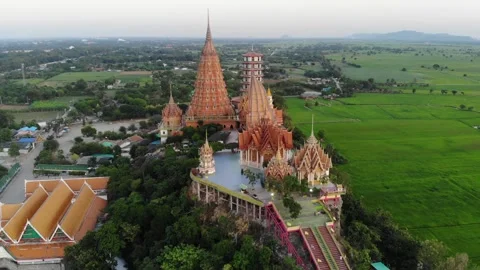 Moving around Wat Tham Sua temple in Kanchanaburi drone Stock Footage 194445924