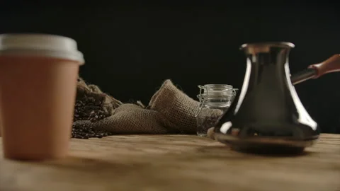 Moving from authentic copper cezve to disposable paper cup for coffee to go Stock Footage 136814692