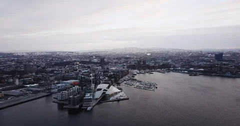 Moving away shot of Aker Brygge and Filipstad in Oslo, Norway Stock Footage