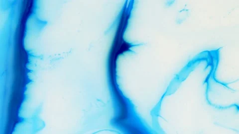 Moving background consisting of blue particles of the current paint on a white b Stock Footage 211472864