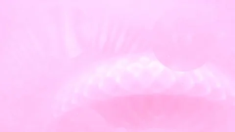 Moving background consisting of red particles of the current paint on a white 스톡 동영상 194032642