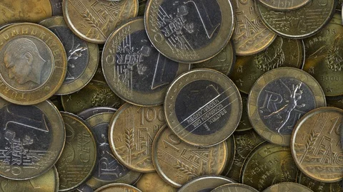 Moving background of different coins. Seamless loop. Stock Footage 101657767