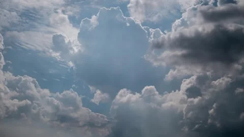 Moving Backlit Clouds with Sun Rays and Birds Stock Footage 318358661