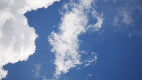 Moving beautiful white cloud with blue sky background at day time Stock Footage 129267504