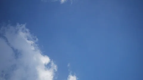 Moving beautiful white cloud with blue sky background at day time Stock Footage 129268942