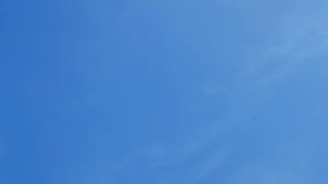 Moving beautiful white cloud with blue sky background at day time Stock Footage 129928989