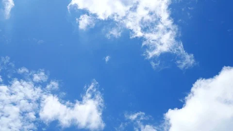 Moving beautiful white cloud with blue sky background at day time Stock Footage 129934040
