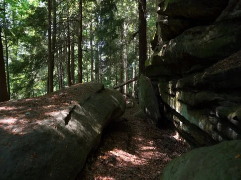 Moving between large rock formations in Cuyahoga Valley Stock Footage 82660488