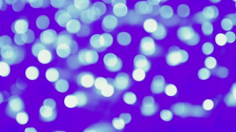 Moving blue glitter lights, defocused light reflections bokeh background Video stock 223382422