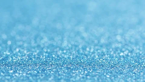 Moving blue, reddish glitter lights, defocused light reflections blue bokeh Video stock 123375616