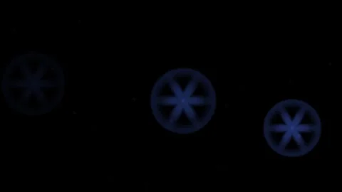 Moving blue shapes with a glowing effect on a dark Stock Footage 339071454