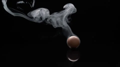 Moving boiled egg black background Stock Footage 58499520