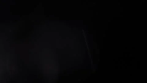 Moving bokeh in the dark Stock Footage 318844750