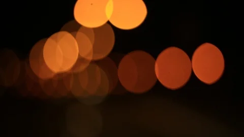 Moving bokeh seen from inside a car driving through the city. Stock-Footage 88513190