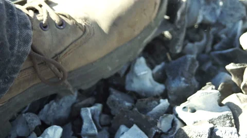 Moving Burned Bones With a Boot Stock Footage 62983836