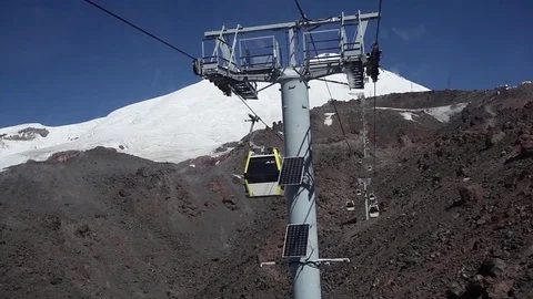 Moving of Cableway Cabins in the Mountain Valley Stock Footage 72542982
