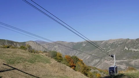 Moving of Cableway Cabins in the Mountain Valley Stock Footage 82606803