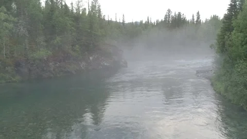 Moving camera above the  mountain river with fog Stock Footage 281639114