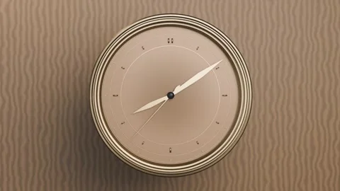 Moving camera bringing round wall clock closer on wavy beige wall, hands Stock Footage 337505106