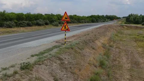 Moving the camera forward along the road on which the car is passing Stock Footage 145466077