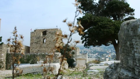 Moving camera in front of Byblos Castle and Roman ruins, Lebanon Stock Footage 119132530