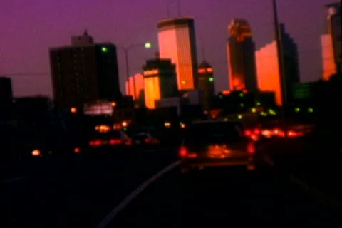 Moving camera into orange dusk city Stock Footage 234548139