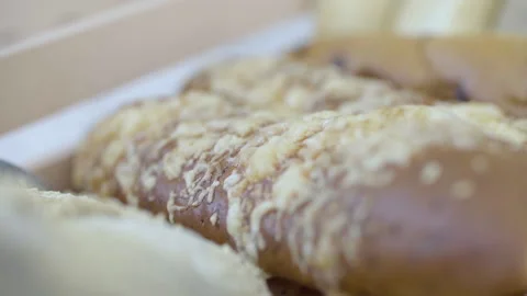 Moving camera over a bread covered with cheese at a bakery Stock Footage 158126021