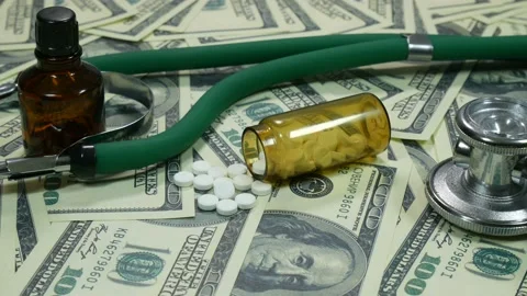 Moving camera over medicaments and dollars Video stock 89449896