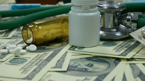 Moving camera over scattered money and medicaments Video stock 89449557