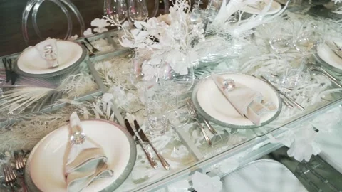 Moving camera over a served table in a restaurant. White table. Stock Footage 172448936