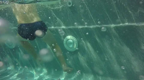 Moving the camera. Spray flew at the camera. Slow motion. Children in the pool. Stock-Footage 65881881